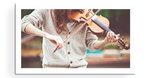 Boy playing Ukulele Williamsburg Music Lessons